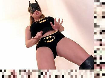 Busty Batgirl Cathy Heaven masturbates with toy