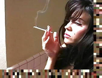 Superb brunette smokes in solo