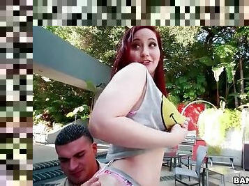 Redhead with a big fat ass lubed outdoors