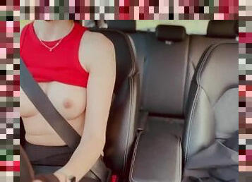 Girl driving and flashing tits