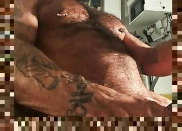 Hairy muscle daddy slaps and punches his massive pecs as he wanks his thiick cock!