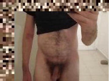 Showing off hairy soft cock in front of the mirror