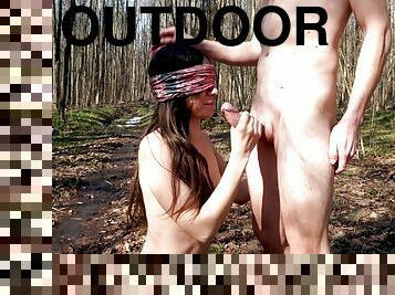 Outdoor blowjob in the spring forest